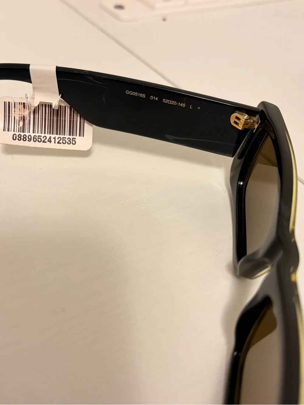 Gucci Black Sunglasses with Gold Accent Logo